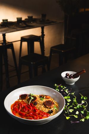 Migas (Spanish Fried Breadcrumbs Dish), Homemade Roast Peppers, Pickled Grapes, Sobrasada Casera (Spanish Homemade Spicy  Spread)  at La Huerta Funky Castizo in Madrid