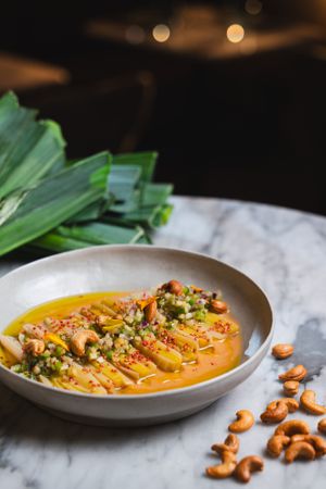 Leeks In Vinaigrette With Kimchi Cream  at La Huerta Funky Castizo in Madrid