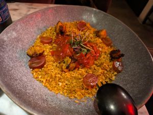 Breadcrumbs with roasted peppers, grapes and fried veg at La Huerta Funky Castizo in Madrid