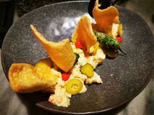 Ensaladilla rusa (the small or big one? We ordered small one and we had to pay the large). Don't know if it was a mistake or not... at La Huerta Funky Castizo in Madrid