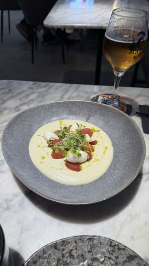 Ajoblanco de aguacate, tomates macerados y piparra en texturas  at La Huerta Funky Castizo in Madrid