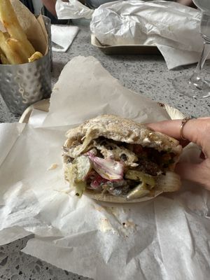Vegan chicken shawarma pitta + added labneh with chips on the side   at Yafo in Bristol