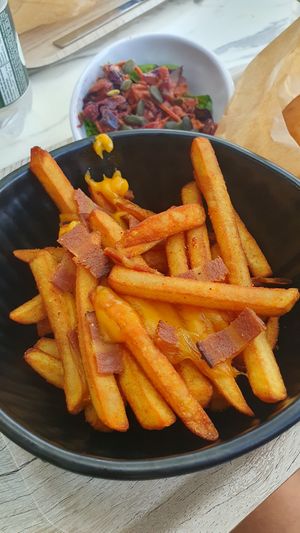 Loaded Fries & Coleslaw at Copper Branch - Nimes in Nimes