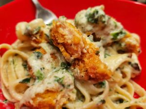 Chik'N Alfredo ~
a creamy white sauce, long strands of pasta mixed with kale & tender pieces of fried seitan Chik'N. at aneeD for Vegan in Norfolk