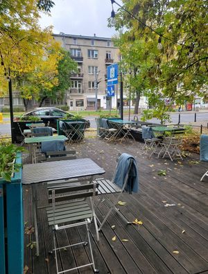 Seating outdoors at Yatta Vegan in Warsaw