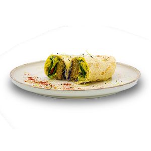 Discover the unique flavor of our crispy falafel vegan wrap! A perfect combination of fresh flavors and natural ingredients, wrapped in a delicious thin dough. Try it now! at Vegasmo in Brasov