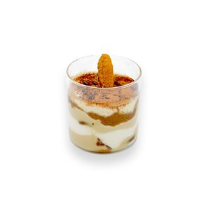 A sweet, multisensory experience with Vegamisu, a vegetarian cake inspired by the classic Tiramisu. Savor each delicious layer of vegan ladyfingers and smooth cocoa cream. at Vegasmo in Brasov