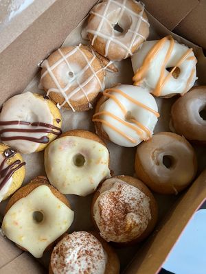Assorted 12-pack mini donuts. Flavors: Orange cranberry (*chef’s kiss*), Apple Pie, Pumpkin Maple, Pumpkin choc chip, Apple Cider, Cinnamon Roll.   #Veganuary at Monster Baby Donuts - Pop up in Columbus