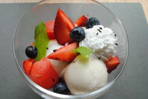 Ice cream with fruits and whipped cococream. at Vega in Wroclaw