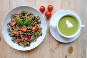 Peas cream and noodle with spinach, vegan cheese, tomatoes and basil. at Vega in Wroclaw