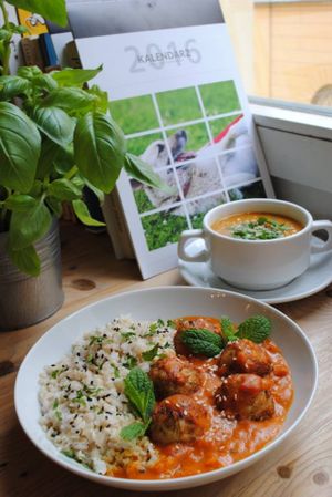 Dahl soup with red lentils and kofta with tofu, tomato sauce and brown rice. at Vega in Wroclaw