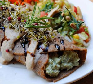 Buckwheat pancake with broccoli-tofu filling with cauliflower sauce.  at Vega in Wroclaw