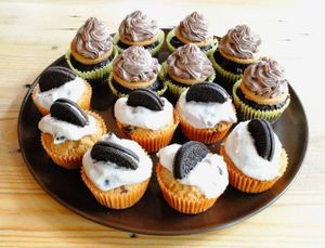Vanila muffins with oreo cream and bilberry and chocolate muffins with coconut cream and cookie.  at Vega in Wroclaw