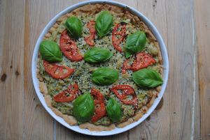 Qiuche with zucchini, cabbage and dill with tomatoes, basil and sesame. at Vega in Wroclaw