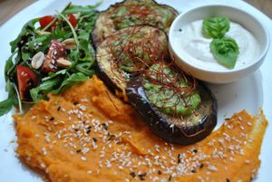Grilled aubergine, with carrots puree, rocket paste and horseradish paste. at Vega in Wroclaw