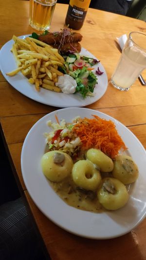 lentil fish (above) and dumplings with mushroom sauce (below) at Vega in Wroclaw