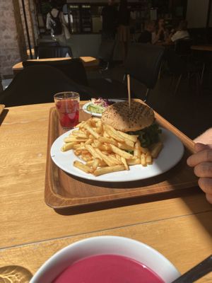 Burger and fries with salads   at Vega in Wroclaw