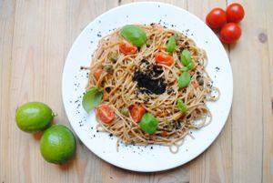 Spaghetti with tomato-'cheese' sauce, capers and olives. at Vega in Wroclaw