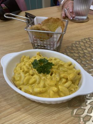 Mac n cheese. With crunchy garlic bread. Very coconuty but nice    at Red Tomato in Phuket