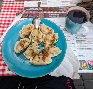 Savoury pierogi & beetroot soup in a cup at Pierogarnia Krakowiacy in Krakow