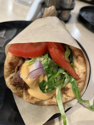 Beyond burger patty pita sandwich   at Piperi Remastered in Naxos