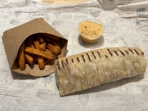 Falafel smash with sweet potato fries and vegan mayo  at Plant Punk in Zagreb