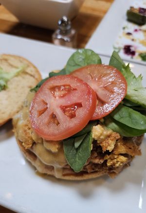 breakfast sandwich - walnuts in patty ruined it for me ☠️ at Zest Kitchen & Bar in Salt Lake City