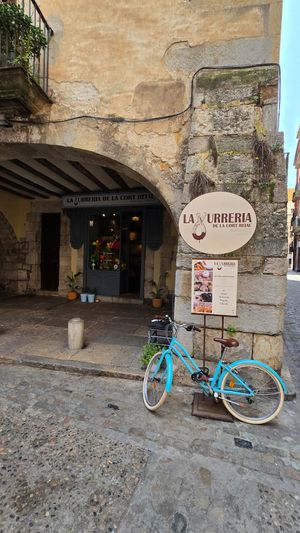 Underneath the arches at La Xurreria de la Cort Reial in Girona