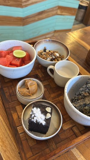 Build your own breakfast: fresh fruit, granola, paleo bread & Vegan chocolate cake  at Mimamori in 