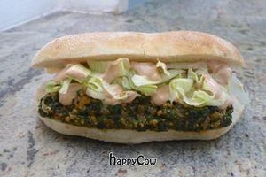 Vegan Panini 'Gran Capriccio': tofu, vegan cheese, roasted bell peppers, sauteed spinach, roasted onions, green salad, vegan cocktail sauce at Il Drago in Porto Torres