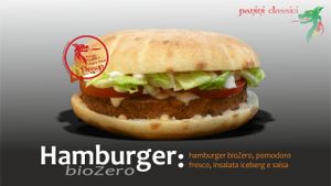 Vegan Hamburger: veg-burger, iceberg salad, fresh tomatoes and sauce at Il Drago in Porto Torres