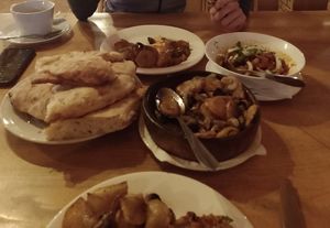Ajapsandali (eggplant stew) and Ojakhuri (roasted potatoes with mushrooms)   at Restaurant Cozy Corner Kazbegi  in Stepantsminda