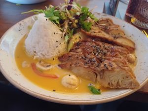 Red curry with rice and a fake duck. at Sen Vegan in Berlin