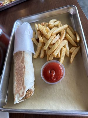 Falafel wrap and fries  at Board Bites in Plano