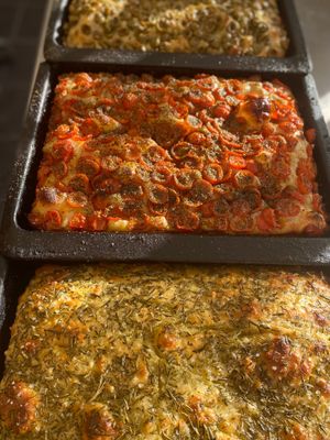 Rosemary and sea salt focaccia 
Garlic cherry tomato focaccia 
Green olive focaccia  at Wapping Sourdough in East London