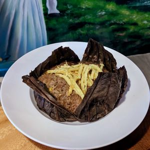 Vegan Lotus Leaf Steamed Rice at Clover Plant Based Kitchen & Bar  in Central Singapore