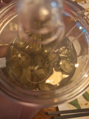 Chilli's on the table at Clover Plant Based Kitchen & Bar  in Central Singapore