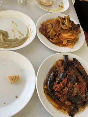 Vegan dishes, eggplant salad (the almost empty plate), eggplant imam and briam   at Taverna Agali in Folegandros