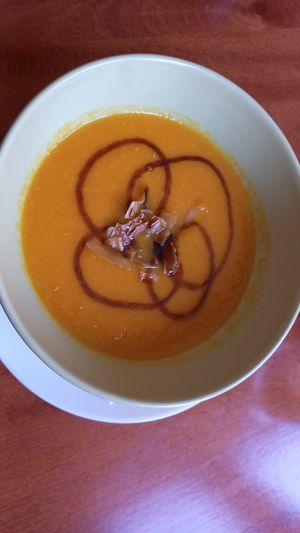 Creamy pumpkin soup with coconut "bacon" (vegan) at Zdravíčko in Olomouc