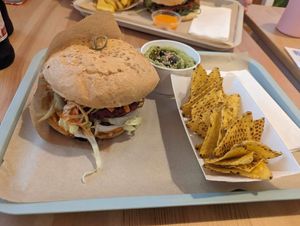 Summer burger with green hummus & corn nachos (wild burger in background)  at Green M'ama in Naples