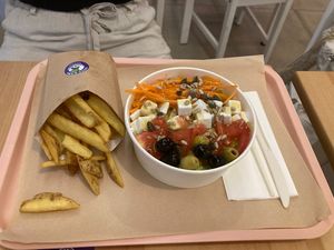 Cesar salad and fries   at Green M'ama in Naples