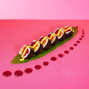 Futomaki with carrots, veg cutlet, purple cabbage, cucumbers, mayonnaise, and teriyaki sauce at Green M'ama in Naples