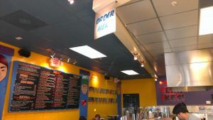 Menu on the wall. Colorful place at Ike's in Salinas