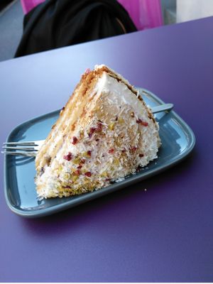 In love with this multilayered coconut cake. It was absolutely delicious at Aux Deux Portes Cafe in Geneva