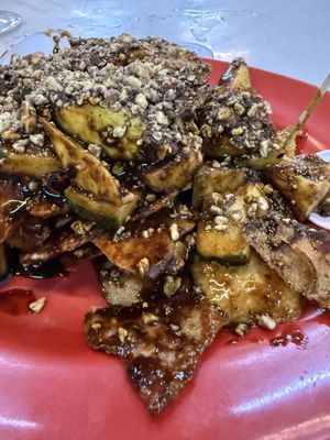 Vegetarian Rojak with turnip, green (semi-ripe) mango, cucumber, pineapple, crackers with savoury black rojak sauce and peanuts   at Chen Ee Vegetarian Food 正一素食 in Ipoh