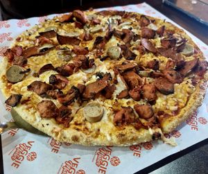 Vegan meatfeast pizza with added mushrooms at Veggie Master in Birmingham