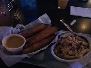 Taquitos Durados w/ Nacho Teese sauce and vegan Mac & Teese! at The Sinking Ship in Indianapolis