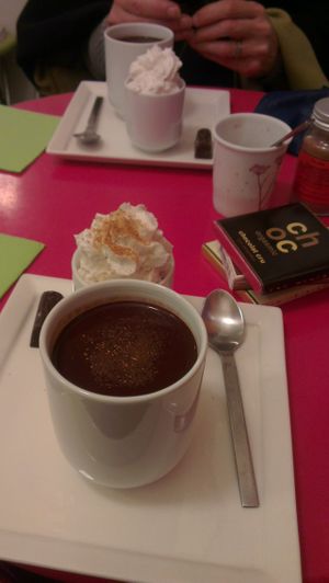 vegan hot chocolate with vegan whipped cream for two at the back of the shop, plus some yummy purchases at ChocoLATITUDES in Paris