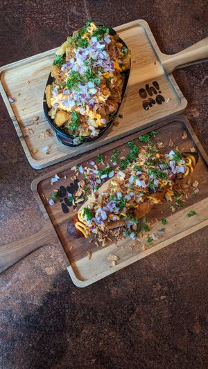 Loaded truffle fries and hot dog at OhMA Gent in Ghent