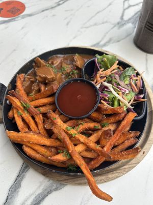 Oh!MA's secret stew (17,90€)
Sweet potato fries (4,50€)
Ketchup
  at OhMA Gent in Ghent